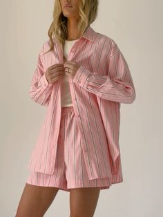 Pink Button-up Sleepwear For Summer, Chic Pink Summer Sleepwear, Vertical Stripes Tops For Summer Loungewear, Striped Sleepwear For Summer Vacation, Chic Pink Shorts For Loungewear, Pink Button-up Sleepwear For Spring, Spring Pink Button-up Sleepwear, Pink Two Piece Set, Striped Set