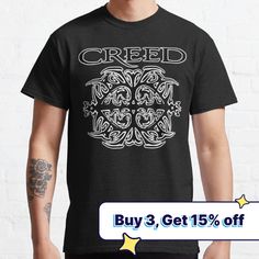 a man wearing a black t - shirt with the words greed on it and an image of