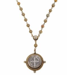 The Miraculous Rosary in Jet Crystals. The San Benito Medallion is a symbol of faith and is blessed by the Vatican. Gold Plate Approx 32" Long, pendant 1" diameter May be worn double with Rosary Extender Swarovski Crystals Made in USA Signature packaging Spiritual Brass Coin Pendant Jewelry, Spiritual Brass Jewelry With Coin Pendant, Nickel-free Symbolic Crucifix Jewelry, Spiritual Round Medallion Necklace With Adjustable Chain, Spiritual Medallion Necklace With Detachable Pendant, Spiritual Bronze Crucifix Necklace, Adjustable Spiritual Medallion Jewelry, Bronze Crucifix Necklace For Spiritual Purposes, Spiritual Miraculous Medal Pendant Jewelry