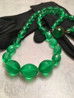 Green beaded neclace, Graduated diamond cut Green Beads, 1940's, 27 inch necklace, Vintage green multi fasceted diamond cut beads by MoniquesFinery on Etsy https://www.etsy.com/listing/479961722/green-beaded-neclace-graduated-diamond Green Beaded Necklace, Green Beads, Necklace Vintage, Green Bead, Simply Beautiful, Diamond Cut, Natural Light, Diamond Cuts, Beaded Necklace