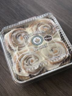 some kind of pastry in a plastic container on a table