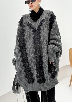 Chunky Gray Knitted Pullover V Neck Lace Casual Knitted Blouse Materials used:knit fabricMeasurement:One size fits all for this item. Please make sure your size doesn't exceed this size: BUST-140cm length 83cm / 32.37"Sleeve length 80cm / 31.2"Cuff 18cm / 7.02"bust 140cm / 54.6"Waist 134cm / 52.26"hem 100cm / 39" Oversized Knit V-neck Sweater With Long Sleeves, Chunky Knit V-neck Sweater For Winter Layering, Acrylic V-neck Sweater For Winter, Knitted Acrylic V-neck Sweater For Winter, Oversized Knitted V-neck Sweater For Winter, Oversized Gray Textured Knit Sweater, Oversized Textured Knit V-neck Sweater For Winter, Oversized Gray Knitted Sweater, Black V-neck Acrylic Sweater