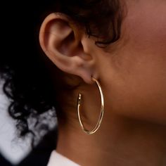 These modern Plain Gold Hoop Earrings are perfect for everyday wear. They are so lightweight, sleek, and comfortable you will want to wear them to work and leave them on for your dinner date. A classic staple piece that you will definitely be tempted to wear no matter what your plans are. This product is guaranteed for life – GLD will repair or replace the item should you experience any defects in craftsmanship or breakage. *Earrings sold in pairs* *14k Solid Gold Posts* Specifications - 1/2" x Vermeil Jewelry, Dinner Date, Custom Earrings, Single Earring, Pendant Bracelet, Earrings Collection, Drop Necklace, Staple Pieces, Gold Hoop