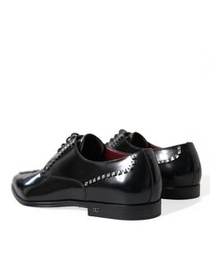 These mens shoes from Dolce & Gabbana are a must-have for any formal occasion. The Derby dress formal style comes in a sleek black color, with 100% leather material and clear crystal detailing throughout. Designed with a leather sole and featuring logo details, these shoes are expertly crafted in Italy. Dolce & Gabbana mens shoes. Model: Derby dress formal Color: Black Material: 100% Leather Clear crystal detailing throughout Leather sole Logo details Made in Italy Crystal Dress, Derby Dress, Leather Formal Shoes, Shoes Model, Bowling Bags, Formal Shoes For Men, Dolce E Gabbana, Leather Hobo Bag, Formal Style