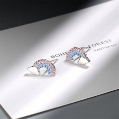 Show off your cheeky personality with these charming earrings boasting a playful design and sleek silvertone metal bases. 0.43 in W * 0.24 in H Silvertone copper & cubic zirconia Cards Sign, Playful Design, Show Off, Metal Base, Turquoise Bracelet, Silver Plate, Cubic Zirconia, Silver Tone, Enamel Pins