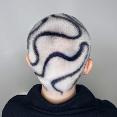 the back of a man's head with an animal print on it