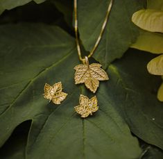 Delicate, Sensual Set with Sycamore Maple Leaves, made of 925 Silver plated with 18-karat gold. Perfect for nature lovers. I designed this spectacular set with attention to the smallest details: the shape, the edge of the leaf blade, and the veins of the sycamore maple leaf. This is an original design, started by studying the morphology of this beautiful leaf. Each element is made of 925 silver coated with 18-karat gold and protected with an additional layer to prevent tarnishing and discolorati Maple Leaf Pendant, Leaf-shaped Jewelry With Matching Earrings, Leaf-shaped Jewelry With Matching Earrings For Gift, Yellow Gold Leaf-shaped Jewelry Gift, Leaf-shaped Jewelry Gift, Yellow Gold Leaf-shaped Jewelry For Anniversary, Yellow Gold Leaf-shaped Anniversary Jewelry, Anniversary Yellow Gold Leaf Jewelry, Nature-inspired Yellow Gold Jewelry With Matching Earrings