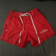 Rise Aquatics, Size Small, Lifeguard Shorts. Worn For Half A Summer, Still Looks Close To Brand New. Red Stretch Swim Trunks With Built-in Shorts, Summer Swimming Shorts In Red, Summer Shorts For Swimming In Red, Red Summer Shorts For Swimming, Red Stretch Athletic Shorts For Beach, Red Swim Trunks With Pockets For Swimming, Red Stretch Shorts For Swimming, Sporty Red Swim Trunks, Sporty Red Short Swim Trunks