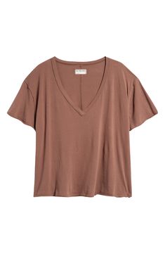 Layer or wear alone this roomy V-neck T-shirt made with exposed seams and raw edges to underscore the relaxed look. V-neck Short sleeves Dropped shoulders 100% cotton Machine wash, line dry Imported Relaxed Fit V-neck T-shirt For Layering, Cheap Oversized V-neck T-shirt, Oversized V-neck Solid Tops, Brown Cotton V-neck Shirt, Beige Relaxed Fit V-neck T-shirt, Things To Buy, V Neck T Shirt, Free People, Cotton Tshirt