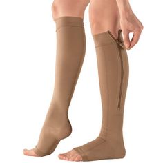 Get all the benefits of firm compression in these Silver Steps™ EZ Zip Open-Toe Compression Socks. 20–30 mmHg socks help stimulate circulation to relieve leg fatigue, discomfort, edema, and symptoms associated with varicose and spider veins. Simply hold together and zip section by section, adjusting as you go; zipper can be worn on either side of the calf. The support stockings' open-toe design makes it easy to check blood flow without removing socks and provides maximum comfort, even with bunio Compression Stockings, Toes Designs, Floral Robes, Compression Socks, Toe Designs, Men Shoes Size, Skin Protection, Skin Color, Drake