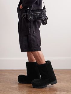 Balenciaga is no stranger to dramatic proportions. Made from black shearling, these 'Alaska' boots are have exaggerated toes, ultra wide shafts and thick rubber soles that are serrated for extra grip. Balenciaga Alaska Boot Outfit, Balenciaga Strike Boots, Alaska Boots, Balenciaga Boots, Black Balenciaga, Suede Chelsea Boots, Ultra Wide, Wardrobe Edit, Shearling Boots