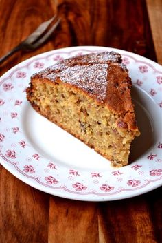 a piece of cake sitting on top of a white plate