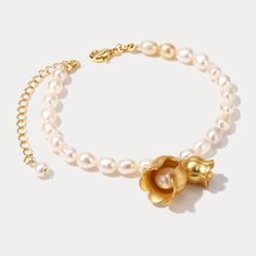 DETAILS Materials:   18K Gold on Brass, Freshwater Pearl Measurements: Length: 17.83"(45.3cm) + Extender: 1.97"(5.0cm) Weight:   5.4 g Choose a lily of the valley exclusive gift box Formal Rose Gold Flower Bracelet, Formal Yellow Gold Flower Bracelet, Feminine Pearl Charm Wedding Bracelets, Feminine Pearl Charm Bracelets For Wedding, Luxury Gold Flower Bracelet, Elegant Pearl Charm Bracelet, Feminine Wedding Jewelry Bangle, Elegant Adjustable Pearl Charm Bracelet, Elegant Adjustable Charm Bracelet With Pearl