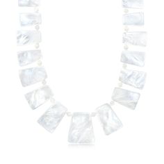 Ross-Simons - Mother-of-Pearl Necklace with 18kt Gold Over Sterling. 18". Embrace a dreamy statement piece so nicely priced! Shimmery 10-32mm trapezoidal mother-of-pearl beads alternate with petite 4mm round beads of the same kind in this big, beautiful necklace. Graduates from 3/4" to 1 3/8" wide. Finishes with an 18kt yellow gold over sterling silver lobster clasp with a 2" extender. Mother-of-pearl necklace. Pearl birthstones are the perfect gift for June birthdays. Formal White High Luster Necklace, Luxury High Luster Mother Of Pearl Jewelry, Luxury High Luster White Pearl Necklace, Luxury White Single Strand Pearl Necklace, Luxury White Single Strand Necklace, Elegant White High Luster Necklace, Elegant Shell Necklace With Pearl Pendant, Elegant Pearl Pendant Shell Necklace, Formal Pearl Necklace With High Luster