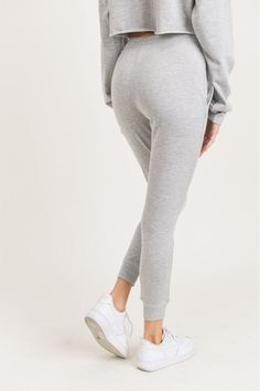 So soft, so plush, and so versatile. Take these cuffed joggers out and about (when you have the chance) or wear them inside the house. Drawstring closure. 65% polyester, 35% cotton. French terry. Comfortable Leisure Joggers With Elastic Cuffs, Sporty Activewear With Elastic Cuffs For Lounging, Trendy Stretch Joggers With Ribbed Waistband, Comfortable Joggers With Elastic Cuffs For Leisure, Comfy Joggers With Elastic Cuffs For Leisure, Trendy Joggers For Lounging In Fall, Trendy Stretch Joggers For Loungewear, Trendy Stretch Joggers For Lounging, Trendy Leisure Joggers With Elastic Cuffs