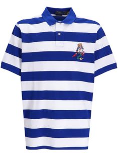 blue/white cotton horizontal stripe pattern logo print at the chest signature Polo Bear motif polo collar front button placket short sleeves short side slits high-low hem Blue Polo Shirt With Striped Collar, Cotton Polo Shirt With Vertical Stripes, Cotton Short Sleeve Polo Shirt With Vertical Stripes, White Horizontal Stripe Cotton Polo Shirt, White Cotton Polo Shirt With Horizontal Stripes, White Striped Cotton Polo Shirt, Blue Polo Shirt With Horizontal Stripes, Blue Striped Polo Shirt With Polo Collar, White Horizontal Stripe Polo Shirt For Summer