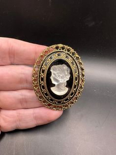 This is a cute piece with great detail.  In good vintage condition with minor wear. Antique Cameo Brooch Collectible, Vintage White Cameo Brooch, Collectible Oval Cameo Brooches, Antique Oval Cameo Brooch, Collectible Cameo Pendant Brooches, Brooch Pin, Vintage Jewelry