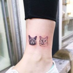 two cats tattoo on the ankle with one cat's face and another cat's head