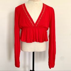 Urban Outfitters Cropped Blouse Lace Trim Boho Fall Festival Long Sleeve Elastic Wrist Red Size Small New With Tag Please Refer To Photos For Size Measurements Red Fitted V-neck Top, Chic Long Sleeve Tops By Urban Outfitters, Urban Outfitters V-neck Blouse For Fall, Red Cropped Blouse For Spring, Fitted Long Sleeve Blouse By Urban Outfitters, Casual V-neck Blouse By Urban Outfitters, Chic Red V-neck Top, Chic Cropped Blouse From Urban Outfitters, Chic Stretch Tops From Urban Outfitters