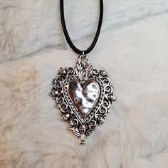 Vintage Style Large Heart Angel Fairy Charm Necklace. Charms Are Approximately 39x41mm. Comes On A 17.5 Inch Black Rope Cord With A Lobster Clasp And 1.5 Inch Extension Chain. #Heart #Silver #Vintage #Goth #Punk Silver Bohemian Necklace For Valentine's Day, Bohemian Silver Necklace For Valentine's Day, Gothic Heart Charm Necklace For Gift, Gothic Silver Heart Necklace For Valentine's Day, Silver Gothic Heart Necklace For Valentine's Day, Bohemian Silver Heart Charm Necklaces, Bohemian Silver Heart Charm Necklace, Silver Heart Necklace For Valentine's Day, Silver Spiritual Heart Necklace For Valentine's Day