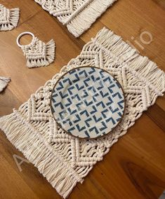 Macrame Placemats is a decor that will add elegance and comfort to your dining room, kitchen and living room. You can order it for the tables in your own home or as a great gift. The Placemats sizes; 13x10 inch (32x24 centimeters). You can order rectanguler plate mats as a set of 4 or a set of 6. Color options are available. The plates in the image are not included in the price. We carefully prepare handmade products made of 100% cotton yarn for you. Each piece is mindfully crafted and may vary slightly from photo. We can take special orders. You can contact us. Macrame Plate Mat, Macrame Placemats, Macrame Placemat, Plate Mats, Macrame Table, Plate Mat, Macrame Patterns Tutorials, Dining Table Decor, Macrame Patterns