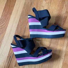 New! Never Worn 5 Inch Wedge Crisp Condition Purple Wedge Heel Sandals In Synthetic Material, Purple Synthetic Wedge Heel Sandals, Purple Open Toe Synthetic Wedge Sandals, Casual Purple Wedge Sandals For Summer, Purple Wedge Heels For Summer, Purple Wedge Heel Sandals For Summer, Purple Wedge Sandals For Summer, Purple Wedge Heel Sandals For Beach, Casual Purple Round Toe Wedge Sandals