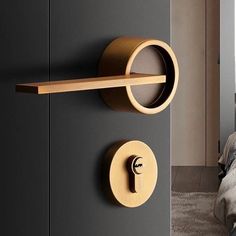 the door handle is made out of wood and has a circular design on it's side