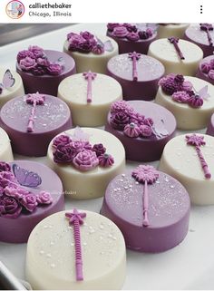 purple and white cakes with flowers on them