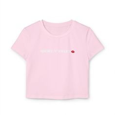 Stay cute and confident in this "Short N' Sweet" baby tee, inspired by Sabrina Carpenter's effortlessly chic vibe! Perfect for fans or anyone who loves a flirty, fun style. With its soft fabric and flattering fit, this tee is your go-to for casual days, concerts, or a laid-back night out. This women's baby tee is designed with a slim fit and mid-length cut, offering a flattering silhouette. Made from 100% organic cotton rib, it provides both comfort and sustainability, making it a versatile and stylish choice for everyday wear. * 100% organic cotton * Slim fit Pink Baby Tee, Bebe T Shirt, Baby T Shirts, Fun Style, Baby T Shirt, Baby Tee, Sabrina Carpenter, Baby Tshirts, Infant Tees