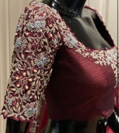 Raw silk maroon blouse with full Silver Zardozi, French Knot, beads, pearls and sequin work all over sleeves and neckline. This blouse can be made in Pure silk too. This blouse can be customized to any color of your choice. Note - Doris and Latkans provided are complementary so please do not complain about them. We do our best to put best latkans for you. Disclaimer - Actual colors may vary slightly due to computer monitors displaying settings. We try hard to match exact color. For sizes 42+ we Maroon Blouse Designs Bridal, Fashionable Saree, Saree Blouse Styles, Saree Blouses Online, Bridal Lehenga Collection, Blouse Embroidery, Maroon Blouse, Traditional Outfit, Try Hard