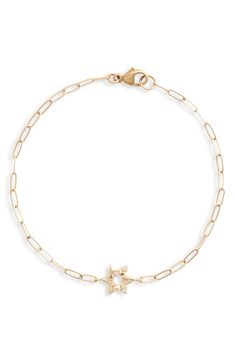 A Star of David pendant is adorned with nine diamonds to enhance the twinkle of a 14-karat-gold bracelet. 6 3/4" length Lobster clasp closure Total diamond weight: 0.05ct. Color: G–H Clarity: SI 14k gold/diamond Handmade in Canada >Diamond Guide Star Of David Bracelet, Yellow Gold Star Charm Bracelet, Luxury Star-shaped Jewelry With Single Cut Diamonds, Celestial Style Yellow Gold Bracelet, Luxury Star-shaped Formal Jewelry, Fine Jewelry Star-shaped For Formal Occasions, Yellow Gold Diamond Jewelry With Star Charm, Elegant Star-shaped 17 Jewels Jewelry, Fine Star-shaped Jewelry For Formal Occasion