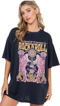 Our "Rock and Roll Tee" is a black t-shirt that that says "rock and roll" in yellow on the front. It has a guitar design on it. These are an oversized fit. Black Cotton Rock And Roll T-shirt, Trendy Band Logo T-shirt For Concerts, Relaxed Fit Rock And Roll T-shirt For Streetwear, Rock And Roll Short Sleeve T-shirt For Concert, Rock And Roll Graphic T-shirt For Music Festival, Trendy Oversized Tops For Concerts, Rock Band Logo T-shirt Relaxed Fit, Rock Band Logo T-shirt In Relaxed Fit, Rock Style Band Logo T-shirt With Relaxed Fit