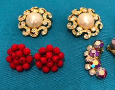 "4 Pair of Vintage Clip On Earring Lot, 1950 to 1970 Earring Lot, Wearable Vintage Earrings, AB Rhinestone Earrings, Pearl Earrings. Red Beaded Flowers all measure from 1\" to 1 1/2\", Clip On Backs, good condition, not missing any stones or beads, all in good condition Downsizing my favorites, I am happy to combine shipping" Vintage Red Jewelry With Rhinestones, Vintage Beaded Clip-on Earrings For Party, Red Vintage Clip-on Earrings For Anniversary, Vintage Beaded Clip-on Earrings For Gift, Vintage Red Clip-on Earrings For Anniversary, Vintage Red Rhinestone Jewelry, Anniversary Vintage Clip-on Earrings With Polished Finish, Luxury Vintage Red Clip-on Earrings, Red Bead Earrings