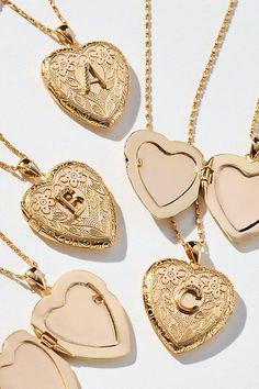 Fancy this: the season’s most treasured giftables. A monogram moment stands out on this functional locket, delicately detailed with a floral design. | Monogram Heart Locket Necklace by Anthropologie in Alphabet, Women's, Gold/Plated Brass Monogram Hearts, Zapatos Mary Jane, Gift Inspo, Heart Locket Necklace, Monogram Jewelry, Jewelry Essentials, Jewelry Lookbook, Accessories Jewelry Necklace, Heart Locket