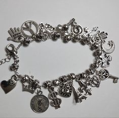 18 Charms Silver Charms Representing Different Areas Of The World 7.5" To 9.5" Silver Charm Bracelets, Junk Bracelets, Dopamine Jewelry, Jin Outfits, Crow Party, Charm Bracelet Ideas, Silver Charms For Bracelets, Chicana Aesthetic, Xoxo Jewelry