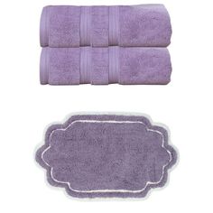 two purple towels and one white towel with an oval border on the bottom, both are folded