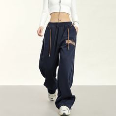 5ft 4''(166cm) tall, 95 lbs(43kg) weight and wearing a size M - Drawstring- Wide straight fit- 2 colors Streetwear Full-length Drawstring Sweatpants, Baggy Full-length Sweatpants For Gym, Full Length Joggers With Drawstring For Streetwear, Sporty Full-length Winter Joggers, Winter Sporty Full-length Joggers, Winter Full-length Sporty Joggers, Winter Workout Pants With Pockets, Full-length Drawstring Sweatpants For Sports, Sporty Full-length Pants With Drawstring