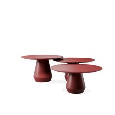 three red tables sitting on top of each other