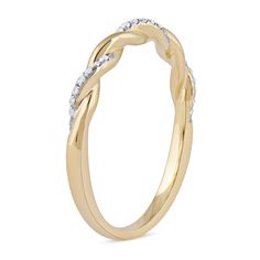 An elegant classic, this diamond twist band in yellow gold is a must-have look for your collection of stackable rings. Created in warm 10K gold Polished and diamond-lined ribbons shimmer in a timeless twist design. This band shines with 1/10 ct. t.w. of diamonds. Modern Twist Yellow Gold Diamond Ring, Modern Twist Yellow Gold Diamond Ring For Formal Occasions, Modern Twist Diamond Stackable Rings For Anniversary, Elegant Twisted Stackable Promise Rings, Modern Twist Yellow Gold Diamond Ring For Anniversary, Anniversary Yellow Gold Diamond Ring With A Modern Twist, Anniversary Modern Twist Yellow Gold Diamond Ring, Modern Twisted Diamond Ring With Accents For Anniversary, Gold Diamond Ring For Anniversary With Modern Twist