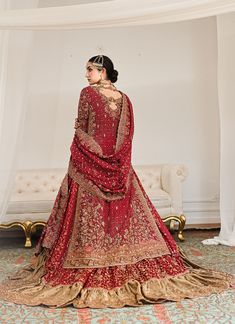 Burgundy Pakistani Bridal Dress in Lehenga Kameez Style is a breathtaking attire adorned with hand-crafted detail of Gota, Zardosi, Naqshi, and Dabka kora. Floor-length Raw Silk Lehenga With Dabka Detail, Floor-length Raw Silk Lehenga With Dabka, Bollywood Style Dabka Lehenga In Jamawar, Reception Anarkali Set With Naqshi Detailing, Reception Anarkali Set With Naqshi In Chinon, Semi-stitched Lehenga In Dola Silk With Dabka Details, Semi-stitched Dola Silk Lehenga With Dabka, Floor-length Raw Silk Dupatta With Naqshi Detail, Semi-stitched Lehenga With Dabka On Dola Silk