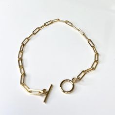 A must have simple and modern links bracelet for your everyday outfit. 14k gold filled rectangular links chain. 9x3mm Elongated flat drawn rectangle cable box chain. Modern Everyday Gold Bracelet With Box Chain, Modern Gold Cable Chain Bracelet For Everyday, Classic Gold Bracelet With Rectangular Links For Everyday, Classic Everyday Gold Bracelet With Chunky Chain, Gold Chain Bracelet With Box Links, Gold Chain Bracelet With Rectangular Box Links, Minimalist Formal Chain Bracelet With Rectangular Links, Gold Chain Bracelet With Rectangular Links Timeless Style, Classic Gold Chain Bracelet With Rectangular Links