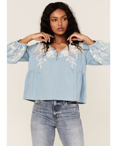 Roper Women's Denim Lace Embroidered Floral Peasant Top, Blue Embroidered Relaxed Fit Top, Embroidered Relaxed Fit Medium Wash Top, Relaxed Fit Embroidered Medium Wash Tops, Embroidered Medium Wash Tops With Relaxed Fit, Embroidered Medium Wash Top With Relaxed Fit, Relaxed Fit Floral Embroidery Tops, Medium Wash Top With Floral Embroidery And Relaxed Fit, Medium Wash Floral Embroidery Top For Fall, Casual Floral Embroidered Peasant Top For Fall