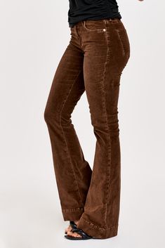 High rise flare leg jeans. It's the lovable fit that sits slightly lower on the waist and fitted skinny in the hips through the knee. Full inseam on stretch velveteen brushed for softness in designer color palettes, accented with wide hem opening.9 1/2" Front Rise (include waistband), 21" Leg Opening, 34" inseam (Size 27) 98% COTTON 2% SPANDEX Machine wash cold, Tumble dry low Imported Zip fly and button closure Five-pocket style Trendy Full-length Flares For Fall, Trendy Full Length Fall Flares, Brown Flare Jeans With Five Pockets, Brown Cotton Flare Jeans With Five Pockets, Trendy Brown Flare Jeans For Fall, High Rise Cotton Flares For Fall, Brown Flare Jeans With Five Pockets For Fall, Fitted Full Length Brown Flare Jeans, Casual Wide Leg Flares For Fall