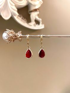 ♥Product Details♥ - Vintage Ruby Red Teardrop Jewel Huggie Hoop Earrings - Huggies size 12mm x 14mm - High quality 14K gold plated huggies - High quality glass bead jewel  - SOLD BY A PAIR - Color may vary batch by batch or due to lighting ♥Materials♥ - All the raw material selected is high-quality - All the earrings are hypo-allergenic & nickel free ♥Shipping♥ Ready to ship from 1-3 business days. <> Please kindly leave your contact phone number when ordering (Esp. for Canada, Sweden & Australi Gold And Red Earrings, Earrings Teardrop, Beaded Jewels, Ruby Earrings, Jewelry Lookbook, Ruby Jewelry, Red Earrings, Fancy Jewelry, Huggie Hoop Earrings