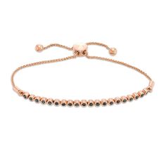 This 1/3 ct. t.w. enhanced black and white diamond bezel-set bolo bracelet is fashioned in 10K rose gold. The wheat chain secures with bolo clasp that adjust up to 9.5 inches in length. Formal Rose Gold Jewelry With Black Diamonds, Rose Gold Jewelry With Black Diamonds, Adjustable Rose Gold Jewelry With Bezel Setting, Rose Gold Tennis Bracelet For Everyday, Everyday Rose Gold Round Tennis Bracelet, Rose Gold Diamond Bracelet With Adjustable Chain, Adjustable Chain Rose Gold Diamond Bracelet, Adjustable Rose Gold Jubilee Diamond Bracelet, Anniversary Rose Gold Jewelry With Black Diamonds