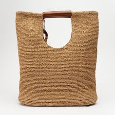 100% Handmade 100% Paper String 100% Vegetal Leather Made in Turkey Size: Height : 47 cm Width: 48 cm Depth: 14 cm Handle Height: 19 cm Natural Color Summer Bag With Removable Pouch, Casual Natural Straw Bag With Removable Pouch, Summer Bag In Natural Color With Removable Pouch, Casual Straw Bag With Removable Pouch In Natural Color, Summer Bags With Removable Pouch In Natural Color, Natural Pouch Bag With Adjustable Strap, Tan Handheld Shoulder Bag With Top Carry Handle, Trendy Natural Pouch Shoulder Bag, Summer Natural Hobo Bag With Removable Pouch