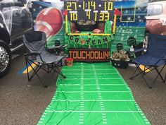 a football field with two chairs and a table