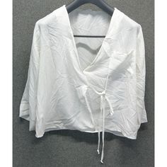 New Without Tags. Item Is Brand New And Never Worn With No Damage, Defects, Or Stains. Us Women's Size M Please See Pictures For Measurements. * Garments Are Stored In A Climate Controlled, Smoke Free Environment. * Items Are Placed In Poly Bags Immediately After Pictures Are Token So What You See Is What You Will Get. Thank You For Looking! Chic White V-neck Wrap Top, Spring V-neck Wrap Top In Solid Color, V-neck Tops For Spring, Spring V-neck Top, Casual V-neck Wrap Top For Day Out, Summer Cotton V-neck Wrap Top, V-neck Tops For Spring Daywear, Spring V-neck Top For Daywear, V-neck Top For Daywear In Spring