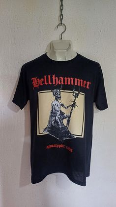 HELLHAMMER APOCALYPTIC RAIDS T-SHIRT New Hellhammer T-Shirt High Quality We'll shipping worldwide. Shipping time range. United States = 20-25 business days Rest of the world = 25-30 business days Celtic Frost, Venom, Black Metal, Halloween Shopping, Favorite Outfit, Gender Neutral, Bathing Beauties, Adult Outfits, United States