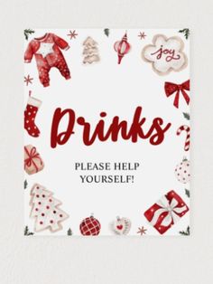 a sign that says drinks please help yourself with christmas decorations and gifts around the frame